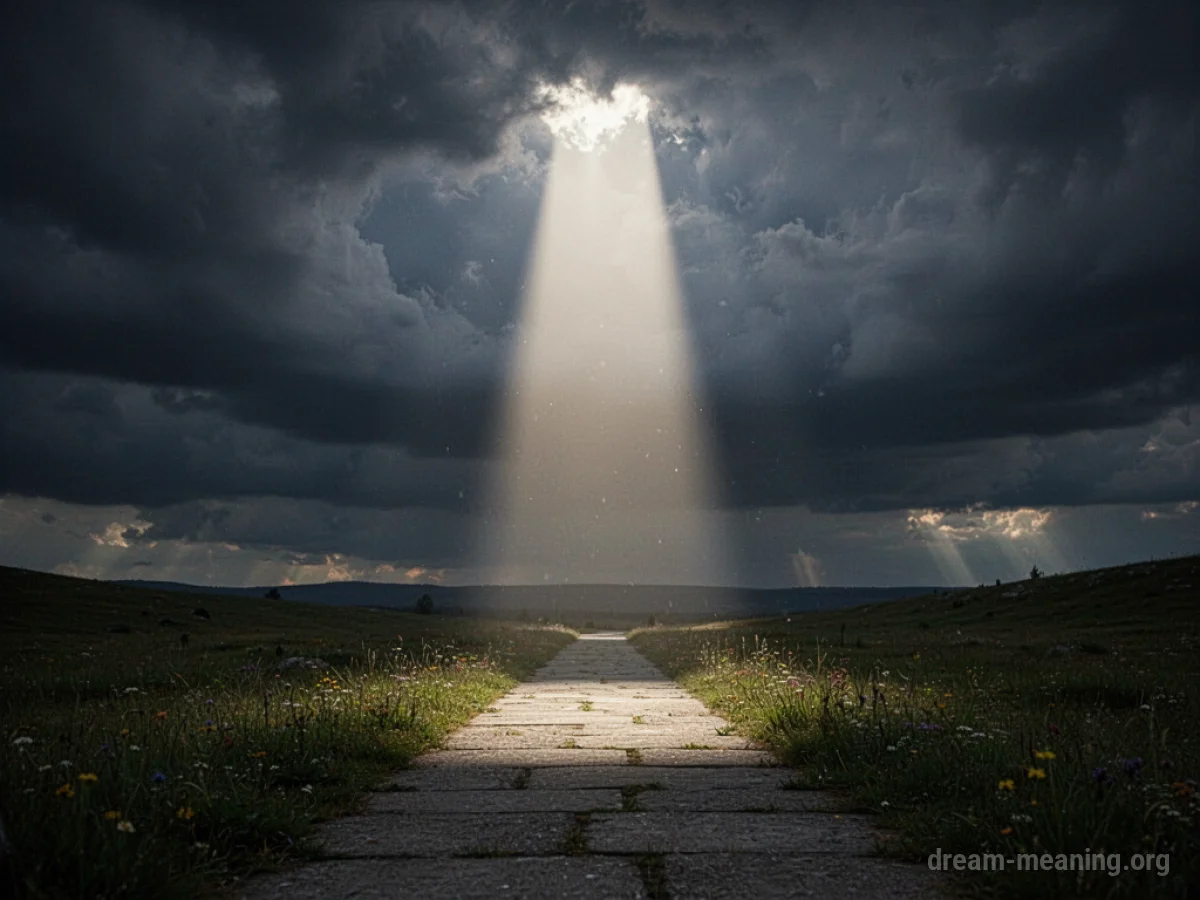 A bright light shines through clouds onto a path.