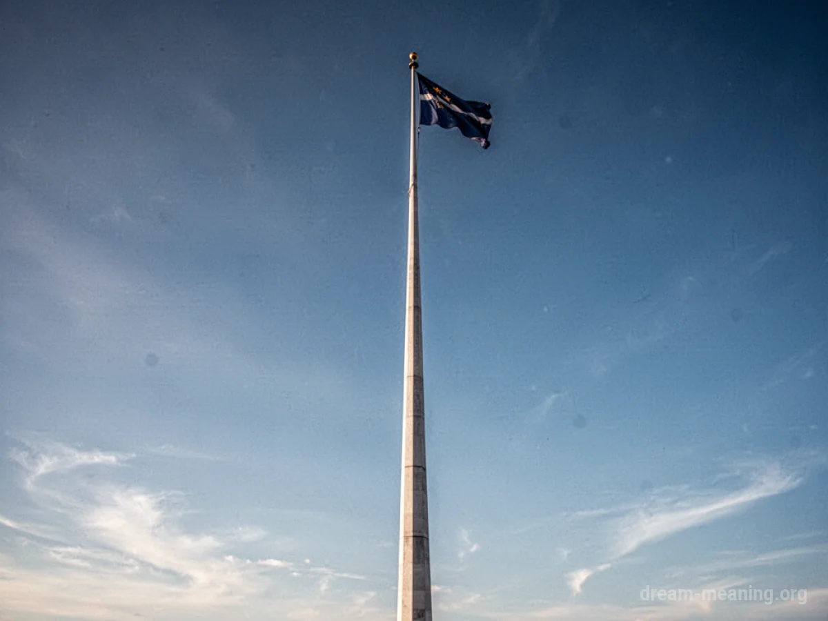 A tall flagpole reaching high into the sky.