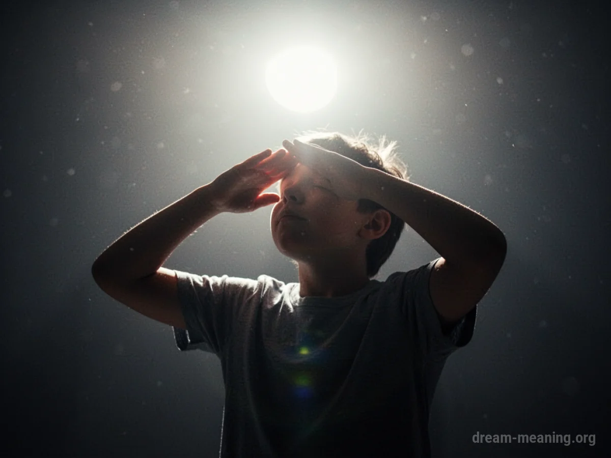 Silhouette of a person covering their eyes from a very bright light.