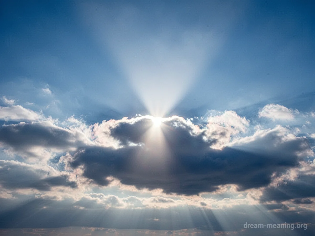 A bright blue sky with a subtle sunbeam.