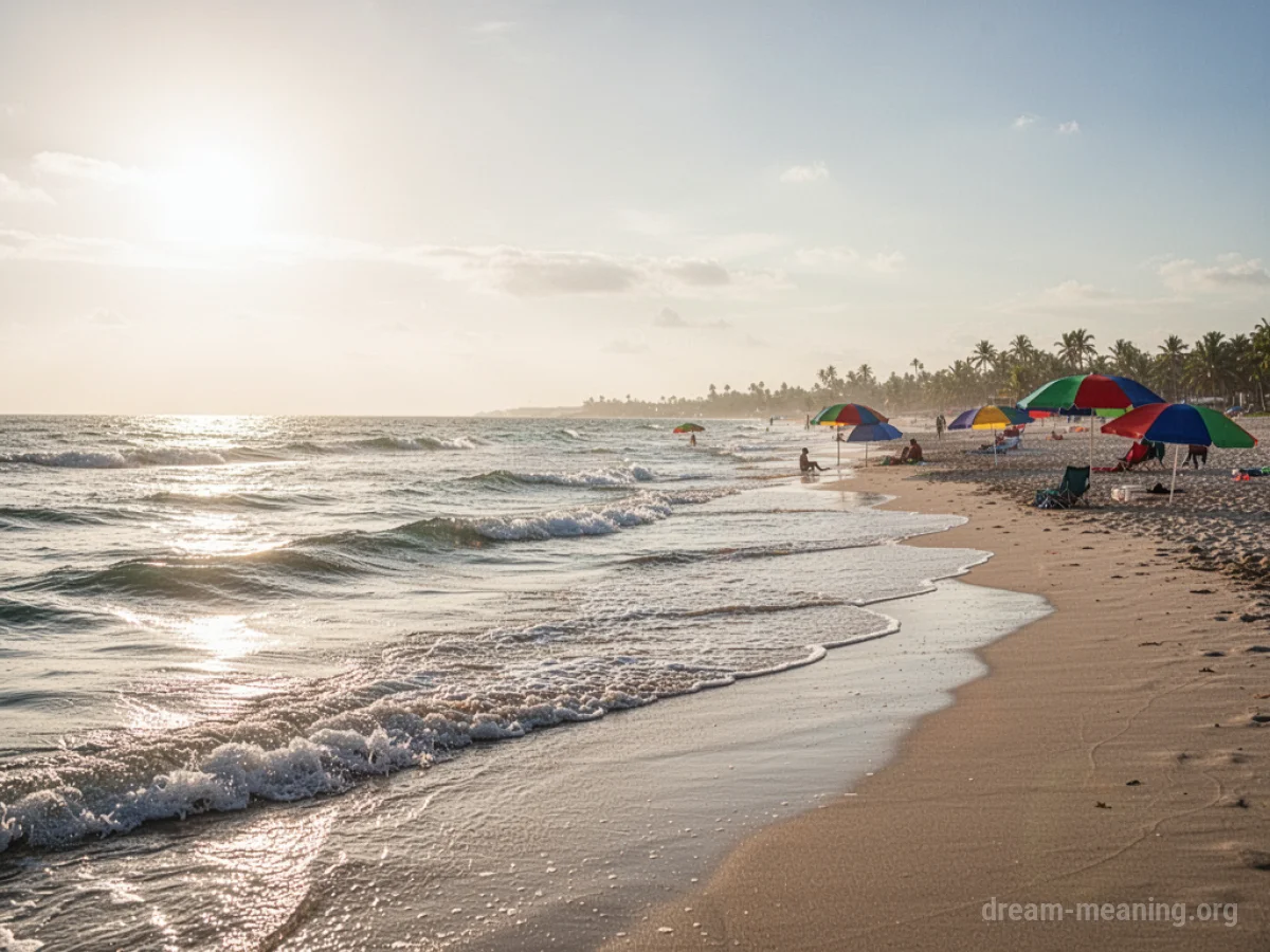 A peaceful beach scene with clear blue water and golden sand.
