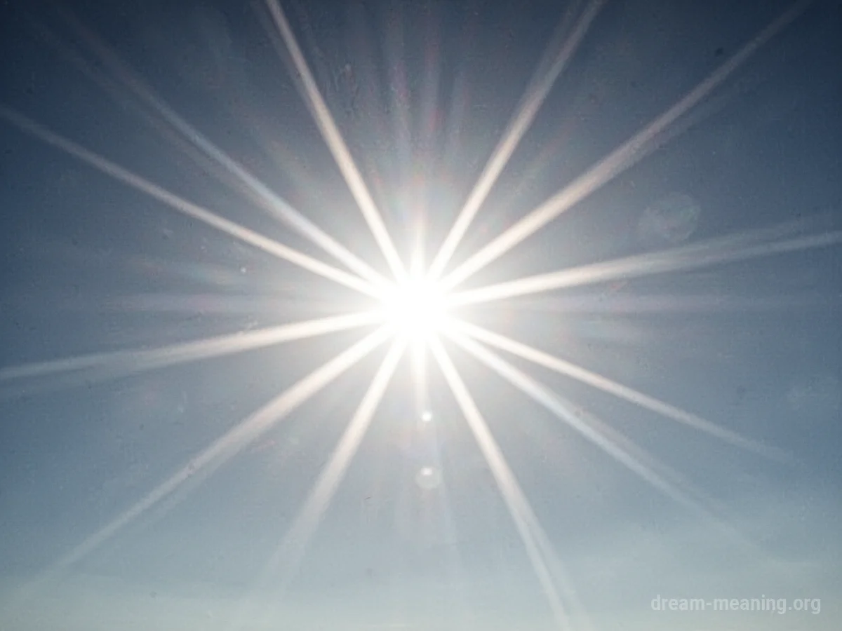 A bright sun with clearly defined rays emanating outward.