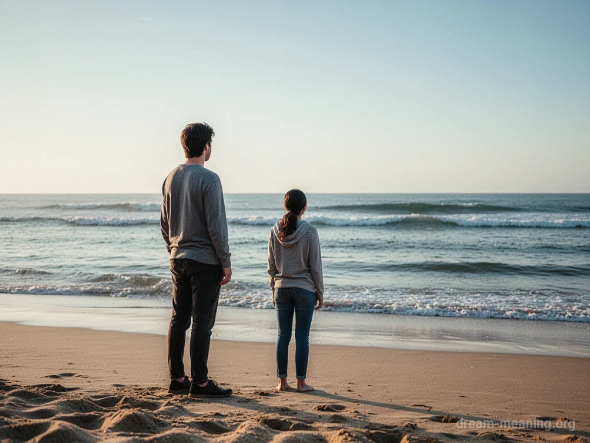 A figure stands on a beach, gazing at the ocean horizon where small waves are visible.